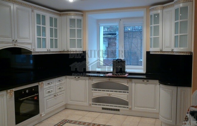 White classic kitchen with black stone countertop