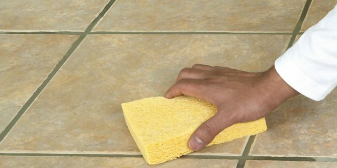 Move the sponge along the gap between the tiles
