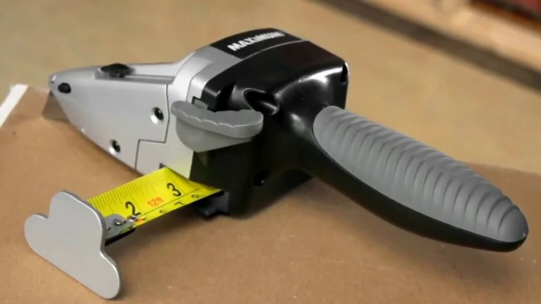 Cutter with tape measure