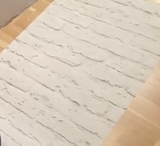 Non-woven wallpaper for brick