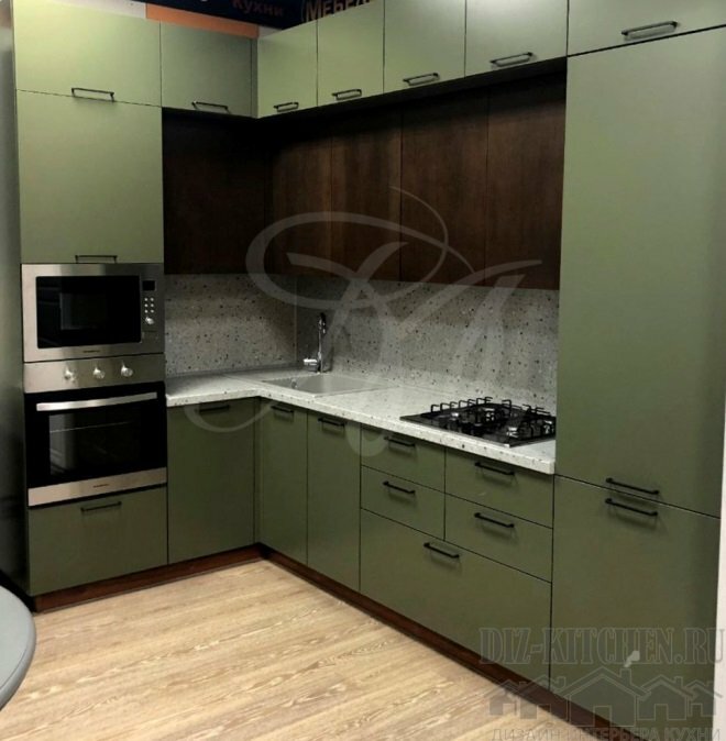 Green kitchen with wood